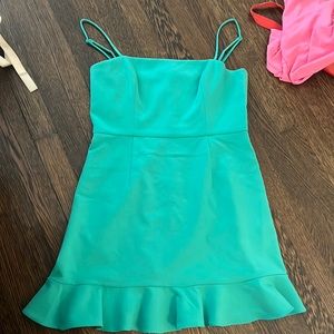 green ruffle mini dress